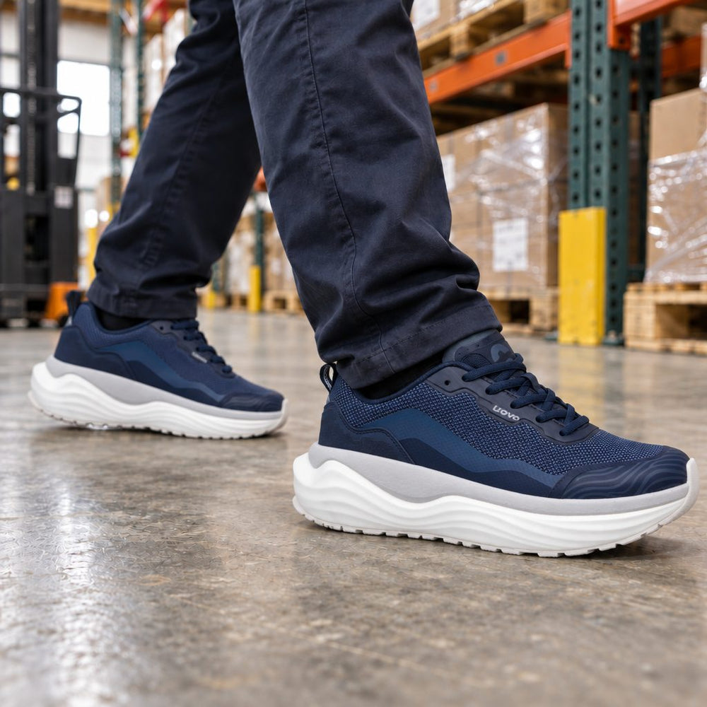 UOVO Flow sneakers in Dark Navy on a concrete warehouse floor
