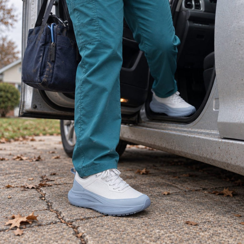 Home health nurse in Breeze sneakers stepping out of a car